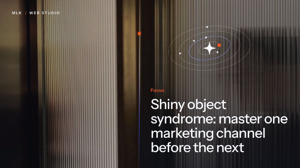 A bright star at the centre of orbit rings with small dots circling it, over ribbed glass, titled Focus